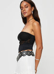 Strapless lace top Elasticated band at bust, asymmetric hem Good stretch, lined bust