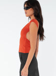 Backless top, slim fitting, high neckline Good stretch, unlined