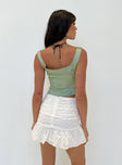 Mini skirt Mid rise Ruched design Invisible zip fastening at back Frill hem