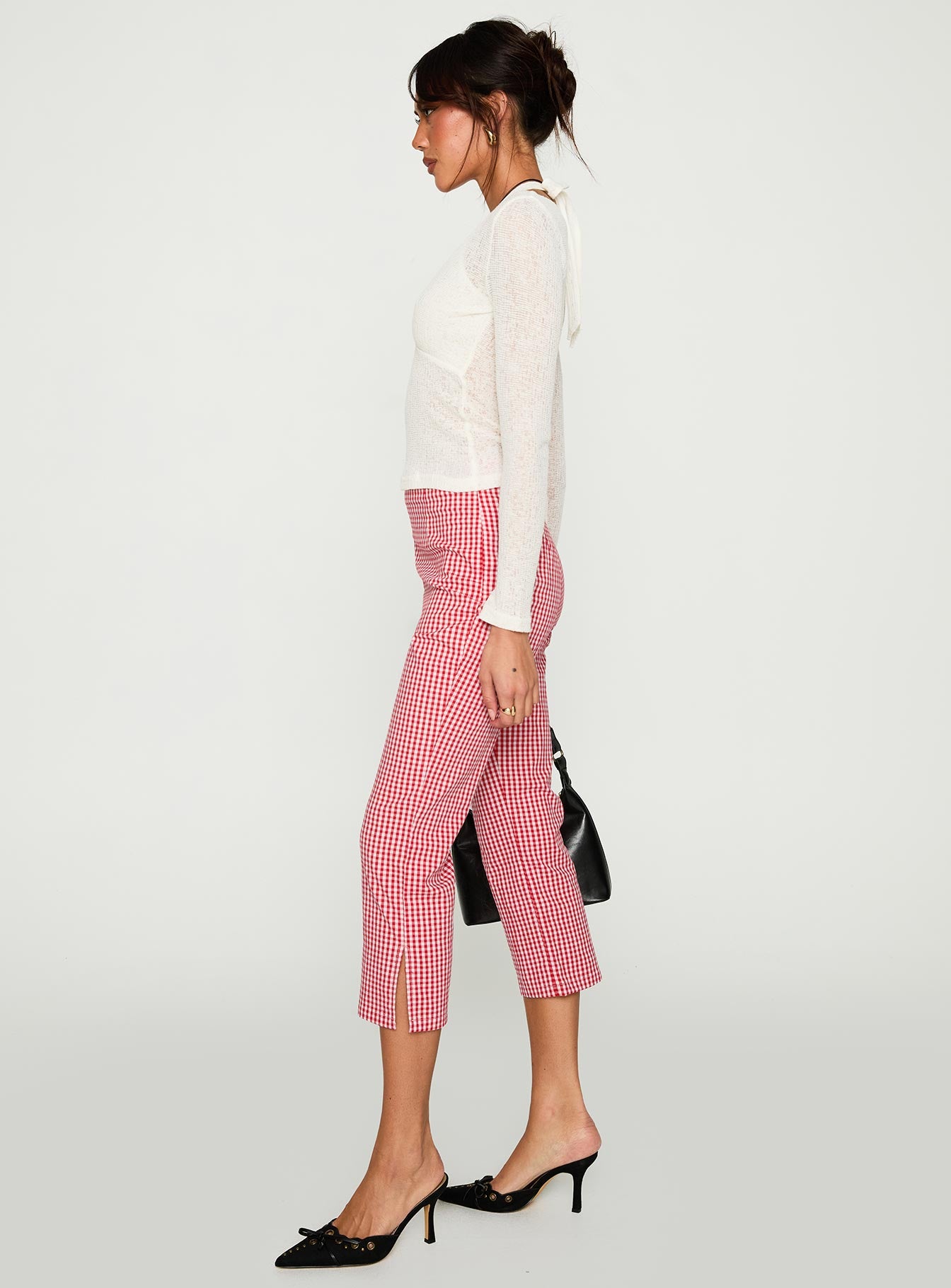 side view of model wearing Princess Polly Mignonette Capri Pant Red Gingham 