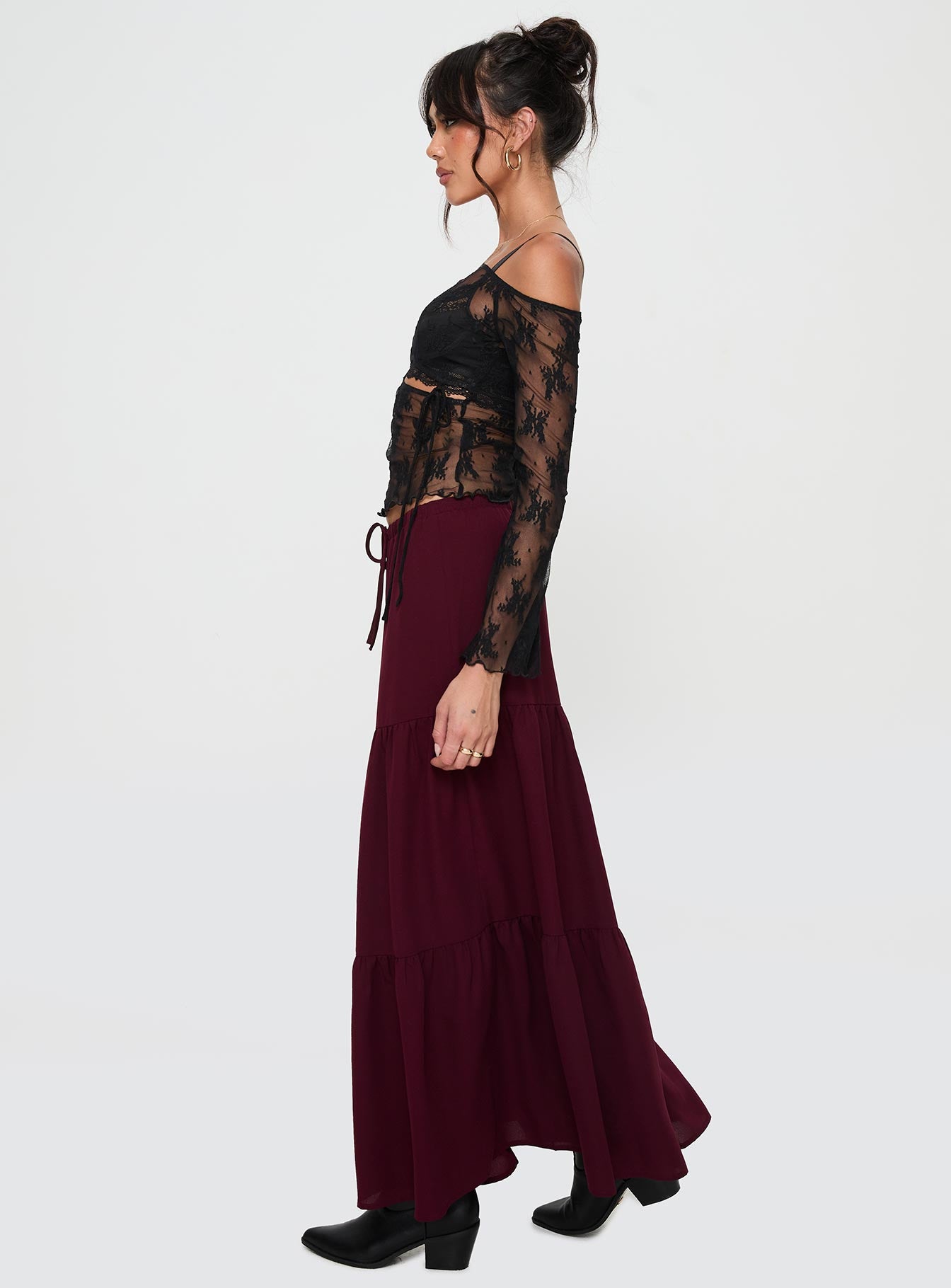   side view of model wearing Princess Polly Whole Again Maxi Skirt Burgundy Maxi 