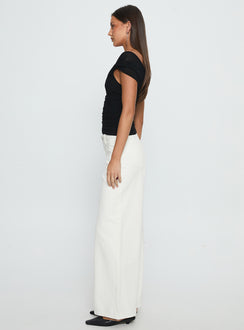 side view of model wearing Princess Polly Catiana Low Rise Wide Leg Jeans White Low Rise Jeans 