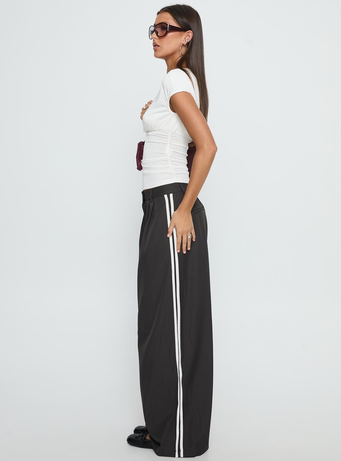 side view of model wearing Princess Polly Serenity Pant Ash Low Rise Pants 