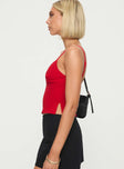 Red crop top Adjustable shoulder straps, v-neckline, hook &amp; eye fastening down back, split at side