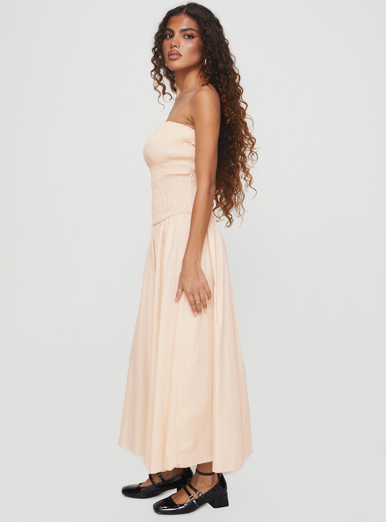 side view of model wearing Princess Polly Atara Maxi Dress Cream Straight Neck 