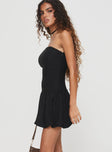 side view of model wearing Princess Polly Nerine Bubble Hem Mini Dress Black Straight Neck 