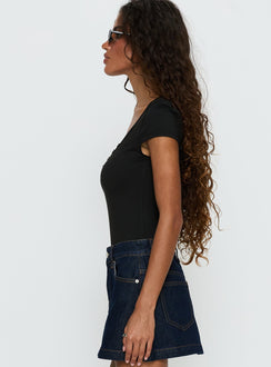 side view of model wearing Princess Polly Laretta Button Up Bodysuit Black Short Sleeve 