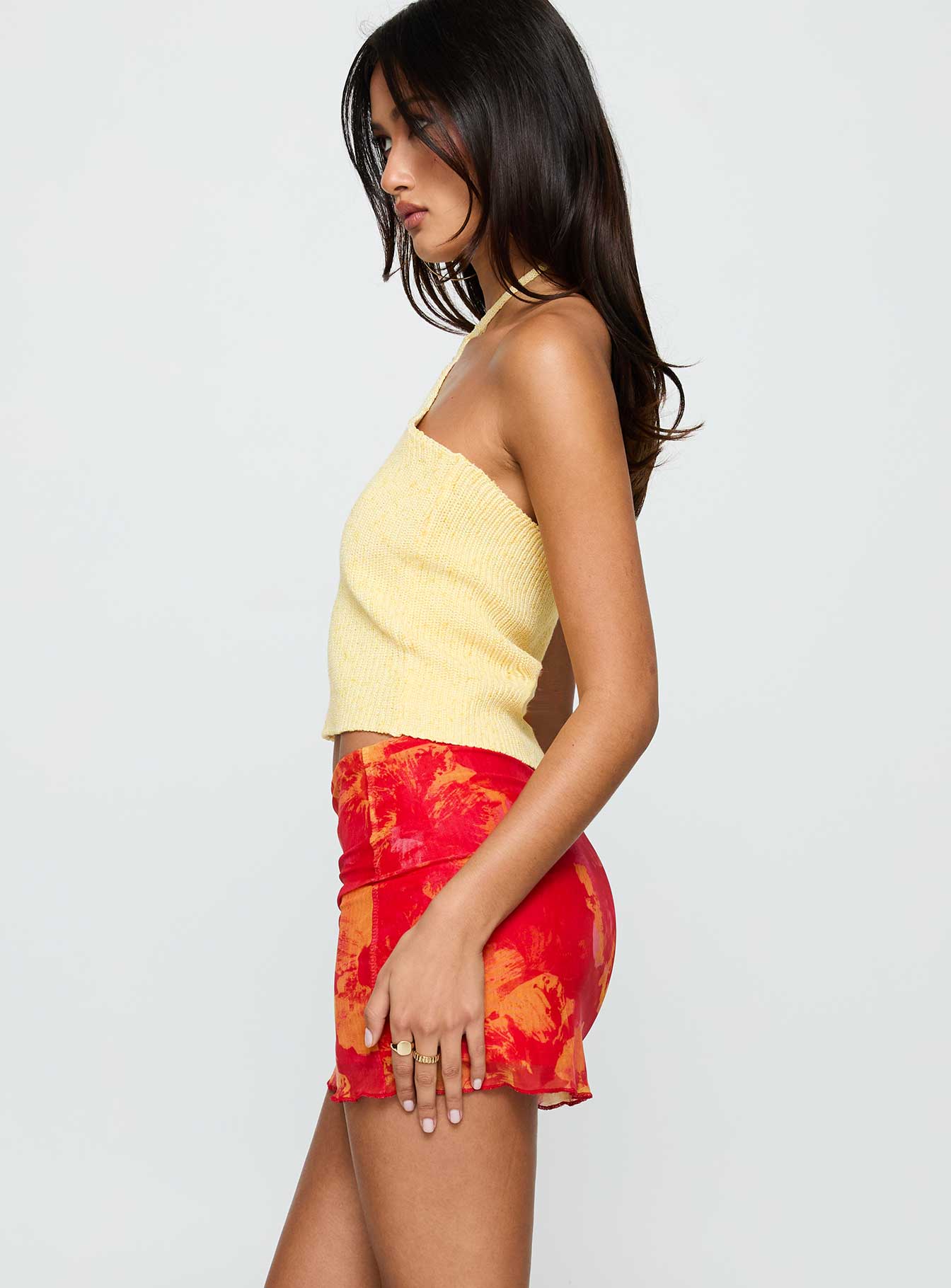   side view of model wearing Princess Polly Liloha Frill Mesh Mini Skirt Orange Multi Mini Skirts 