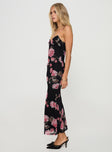 side view of model wearing Princess Polly Manolis Maxi Dress Black / Floral V-Neck 