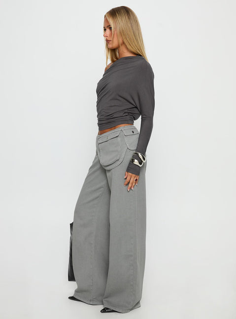 side view of model wearing Princess Polly Incognito Low Rise Wide Leg Cargo Jeans Grey Low Rise Jeans 