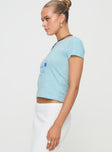 side view of model wearing Princess Polly Cheers To You Tee Blue Short Sleeves Crew Neck 