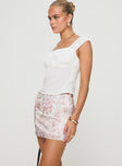 Mini skirt Floral print, lace trim at waist, invisible zip fastening Non-stretch material, fully lined 
