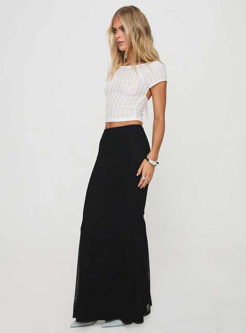   side view of model wearing Princess Polly Topping Maxi Skirt Black Maxi 