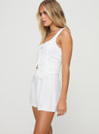 Two-piece linen set Vest top, fixed shoulder straps, square neckline, button fastening down front, faux front pockets High-rise shorts, invisible zip fastening at back Non-stretch material, fully lined 