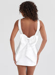 Mini dress, v-neckline, large bow detail, low back Fixed shoulder straps, invisible zip fastening at side