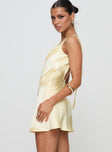 side view of model wearing Princess Polly Kingslie Low Back Mini Dress Baby Yellow V-Neck 