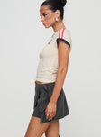 side view of model wearing Princess Polly Karki Low Waist Mini Skort Charcoal 