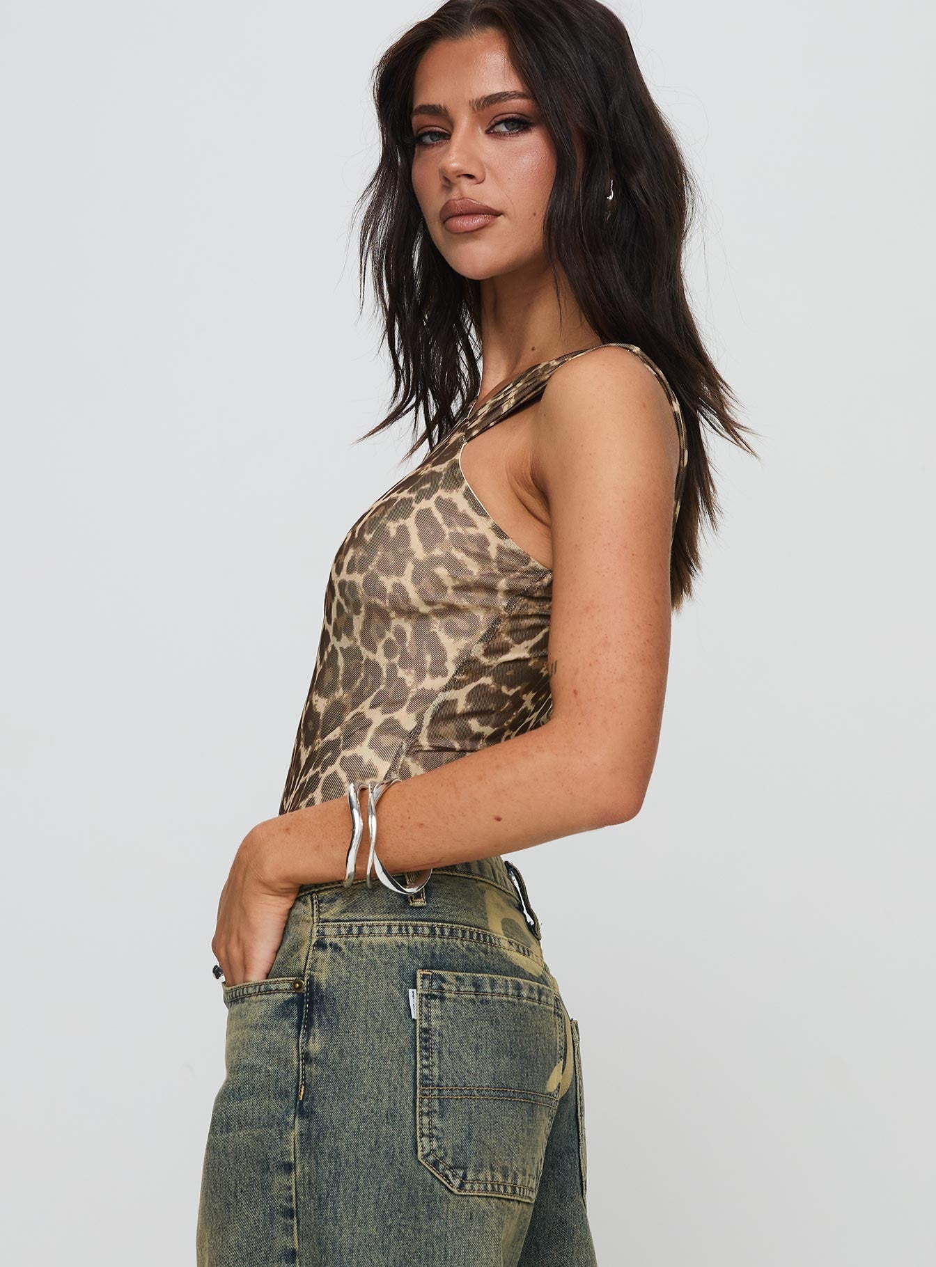 side view of model wearing Princess Polly Serenata Bodysuit Leopard Sleeveless 