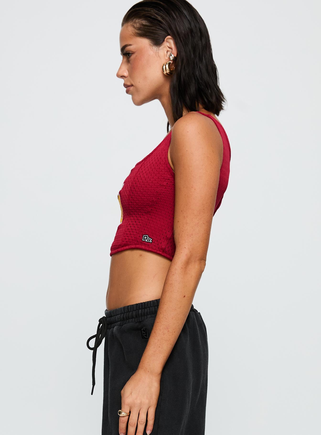 side view of model wearing Princess Polly USC Jersey Corset Top Cardinal Sleeveless Square Neck 