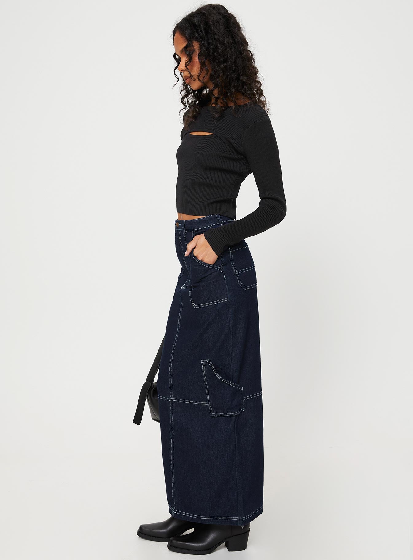   side view of model wearing Princess Polly Vine Maxi Skirt Blue Maxi 