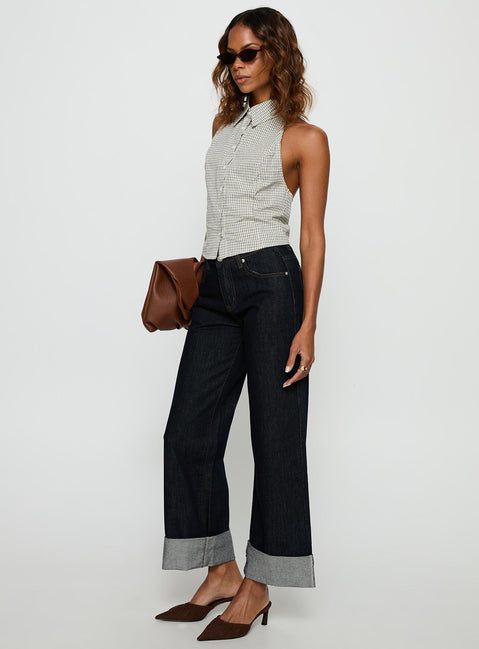 side view of model wearing Princess Polly Squire Mid Rise Straight Leg Folded Hem Jeans Indigo Wash Mid Rise Jeans 