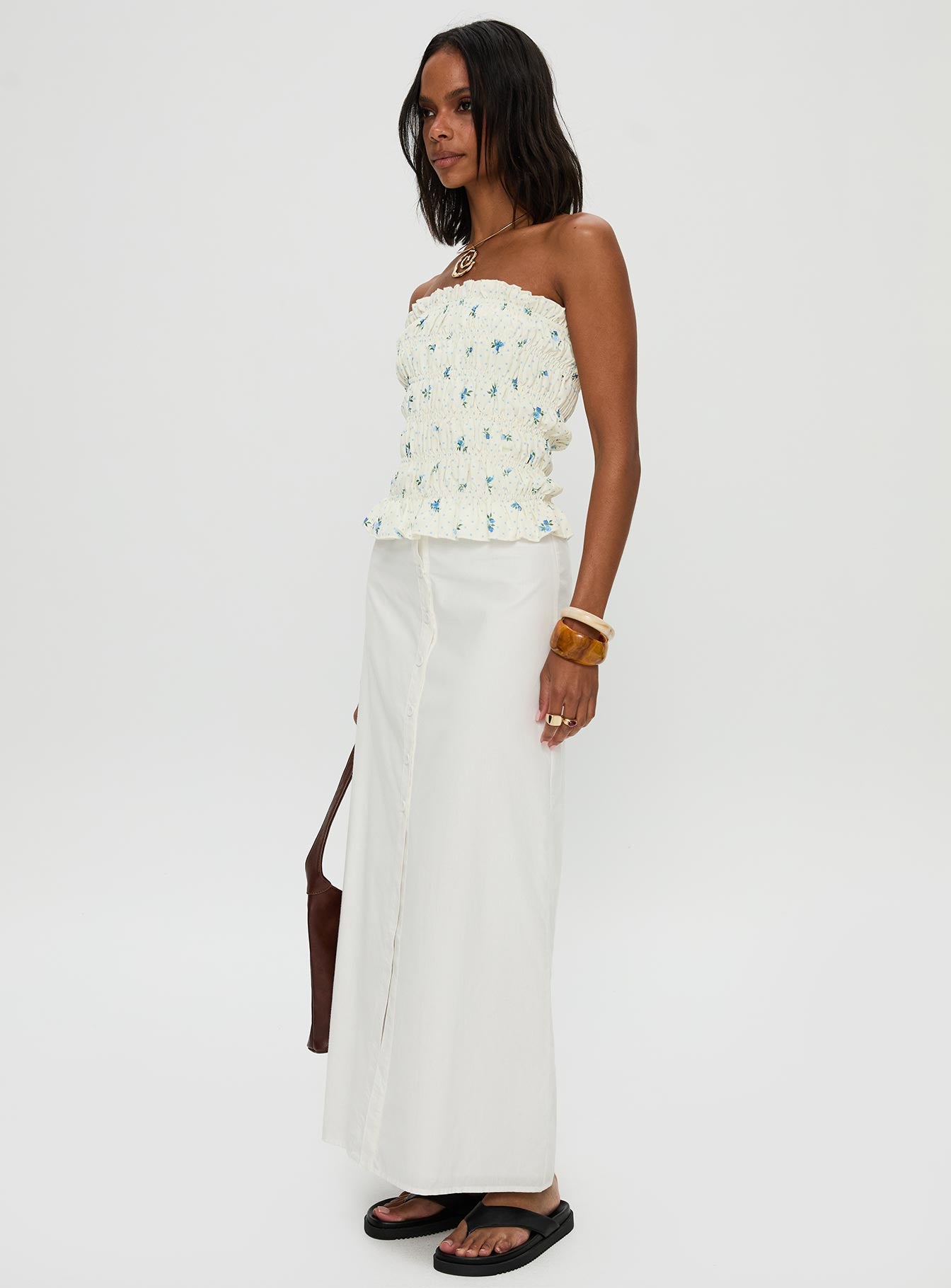   side view of model wearing Princess Polly Jasmira Maxi Skirt White Maxi 