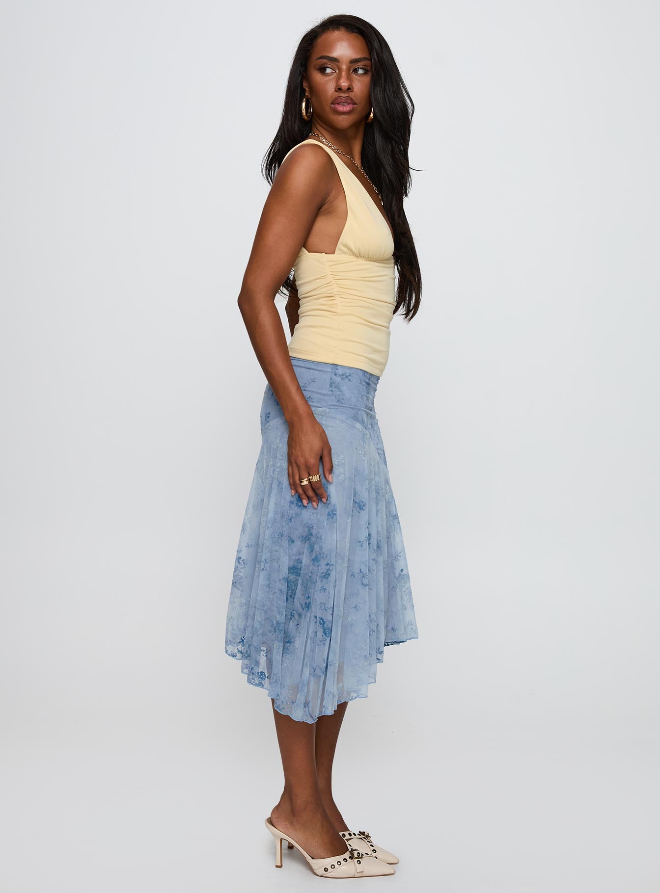   side view of model wearing Princess Polly Summer Rain Asymmetrical Midi Skirt Blue Midi Skirts 
