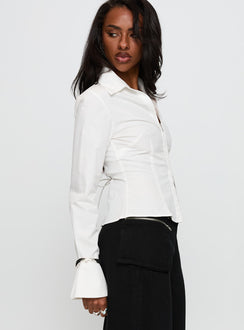 side view of model wearing Princess Polly By The Phone Long Sleeve Collared Top White Full Sleeves V-Neck 