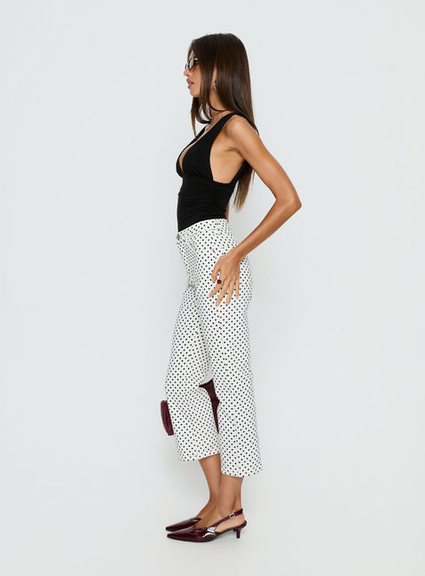 side view of model wearing Princess Polly Lamira Plunge Bodysuit Black Sleeveless 