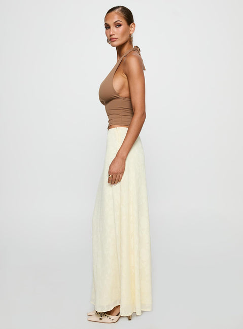   side view of model wearing Princess Polly Su Casa Low Waist Maxi Skirt Yellow Maxi 