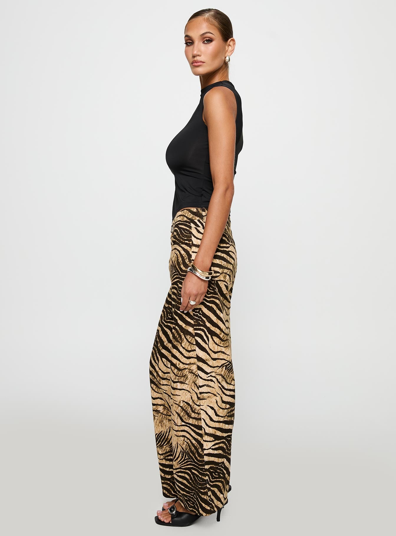 side view of model wearing Princess Polly Low Rise Roomy Pants Multi Low Rise Pants 