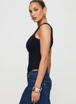 side view of model wearing Princess Polly Lunah One Shoulder Top Black Sleeveless Asymmetric Neckline 