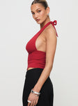 side view of model wearing Princess Polly Whimsy Halter Top Red Sleeveless Plunger 