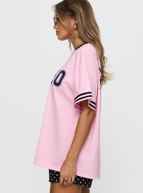 side view of model wearing Princess Polly Cornwall Football Jersey Pink Half Sleeves Crew Neck 