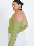 Green top Cold shoulder design Adjustable shoulder straps Fixed sleeves at side Invisible zip fastening at side Split hem