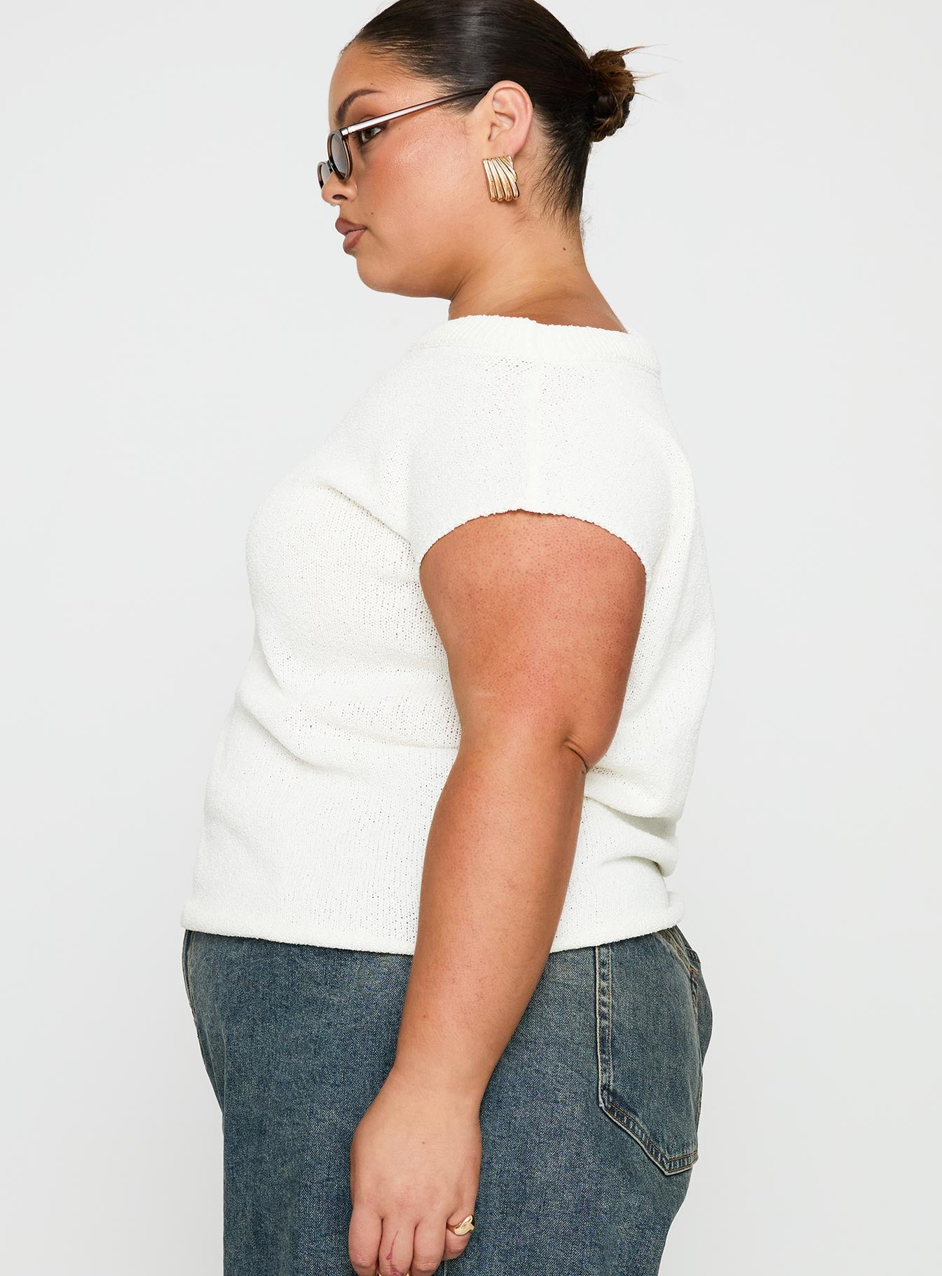side view of model wearing Princess Polly Ashfield Off Shoulder Top White Curve Short Sleeves Asymmetric Neckline 