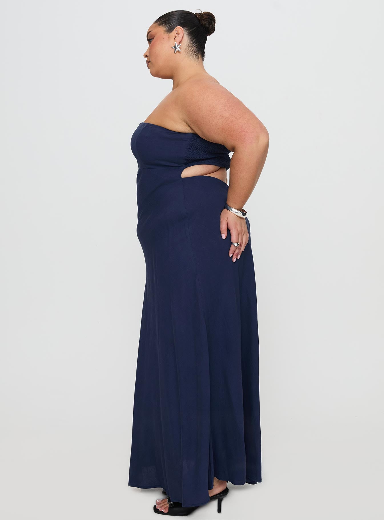 side view of model wearing Princess Polly Yahir Strapless Maxi Dress Navy Curve Straight Neck 