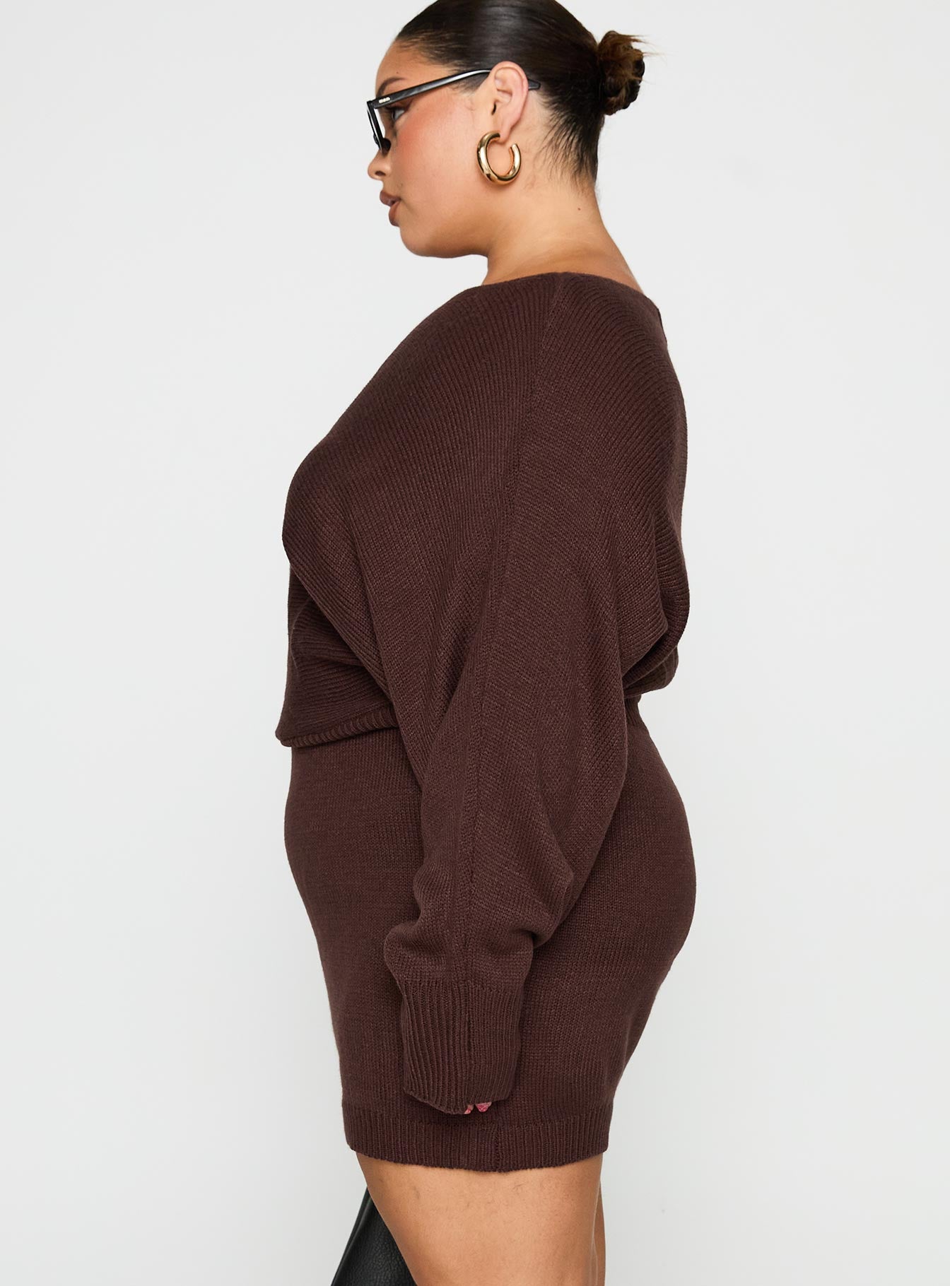 side view of model wearing Princess Polly Bellamie Long Sleeve Mini Dress Chocolate Curve Boat Neck 