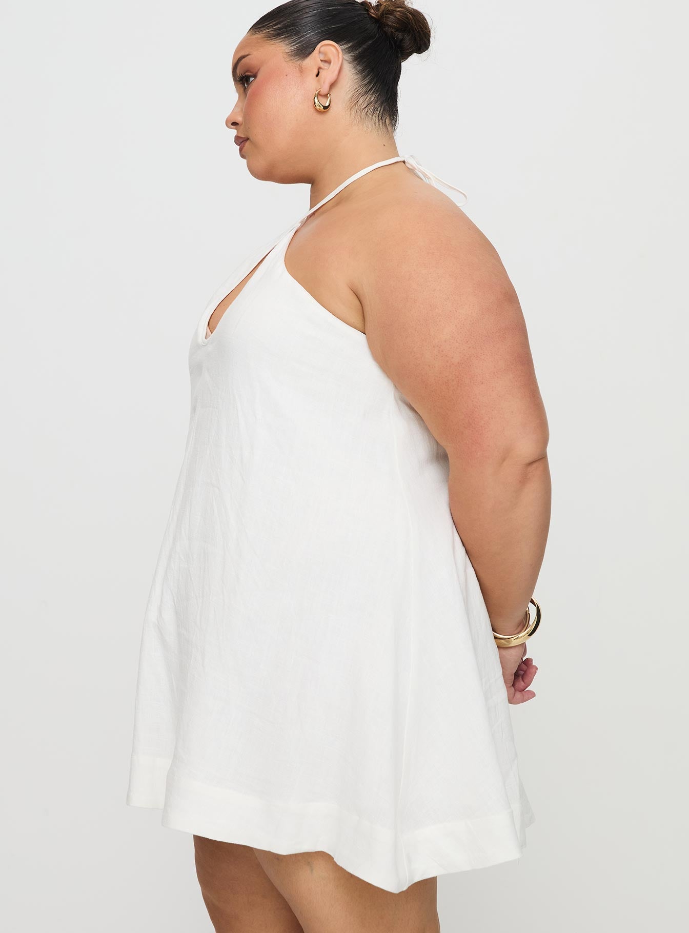 side view of model wearing Princess Polly Thomasina Linen Halter Dress White Curve 