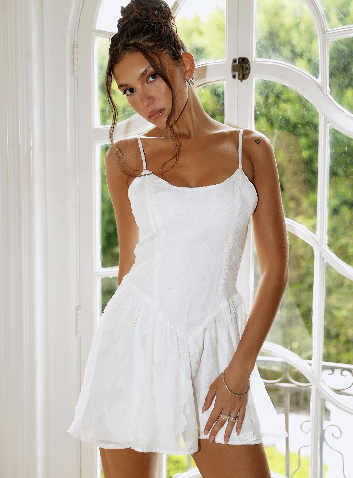 side view of model wearing Princess Polly Diviner Burnout Mini Dress White Scoop Neck 