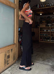 back view of model wearing Princess Polly Jodie Maxi Skirt Black Petite Maxi 