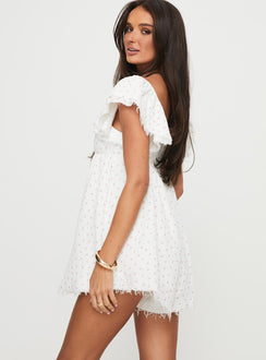 Cherry print playsuit Square neckline, elasticated sleeves, shirred band at & invisible zip fastening back, raw edge hem