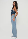 side view of model wearing Princess Polly Serenitia Mid Rise Relaxed Jeans Light Wash Petite Mid Rise 