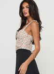 Floral crop top Elasticated shoulder straps, pinched bust, open back with tie fastening Non-stretch material, lined bust