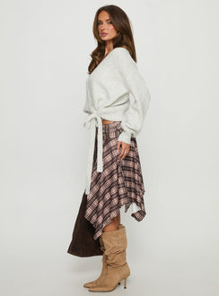   side view of model wearing Princess Polly Scholar Asymmetrical Midi Skirt Brown Check Midi Skirts 