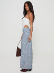   side view of model wearing Princess Polly Rotelle Maxi Skirt Blue Floral Maxi 