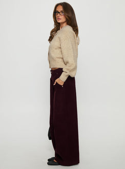 side view of model wearing Princess Polly Jacynda Low Waist Wide Leg Corduroy Jeans Currant Mid Rise Jeans 