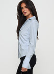 side view of model wearing Princess Polly Rush Hour Long Sleeve Top Blue Stripe Full Sleeves High Neck 