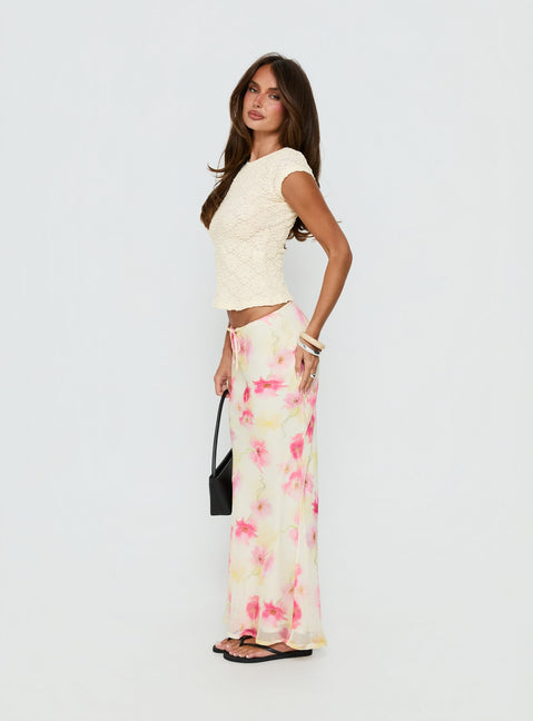   side view of model wearing Princess Polly Mercer Maxi Skirt Yellow Floral Maxi Skirts Skirts 