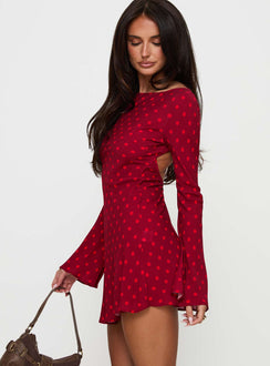 side view of model wearing Princess Polly Good Graces Long Sleeve Mini Dress Red Dot Boat Neck 